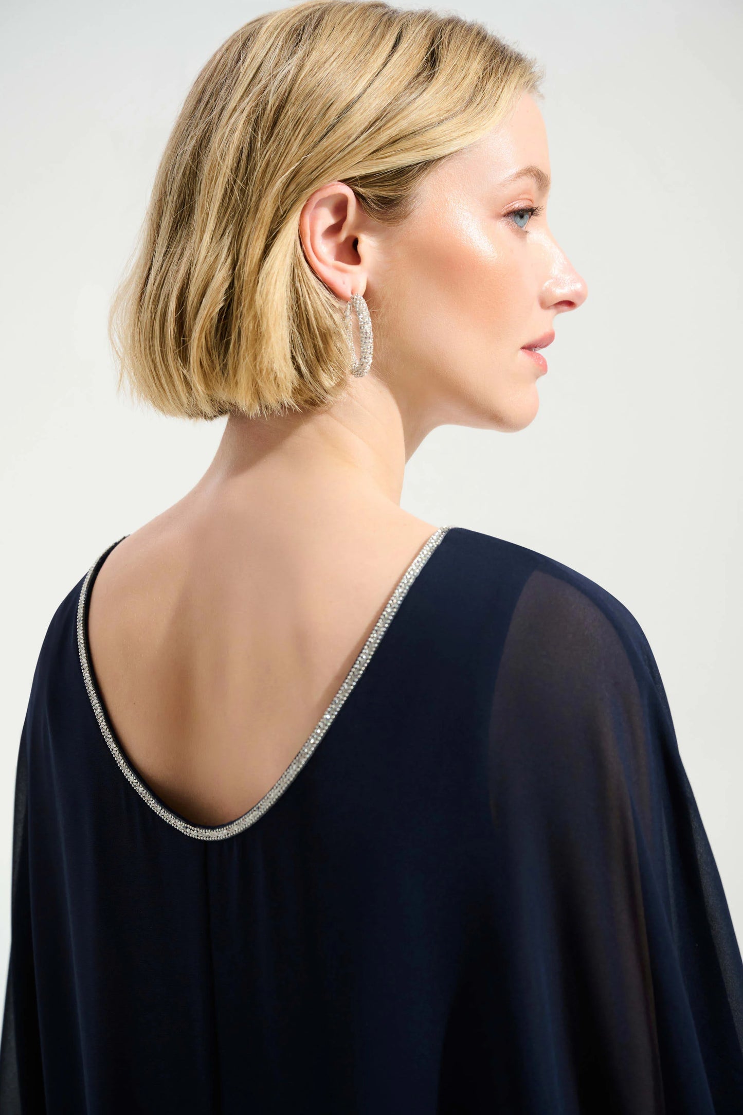 Joseph Ribkoff Signature | Cascade Knit Sheath Dress With Chiffon Poncho Overlay
261707 - ROYAL SAPPHIRE